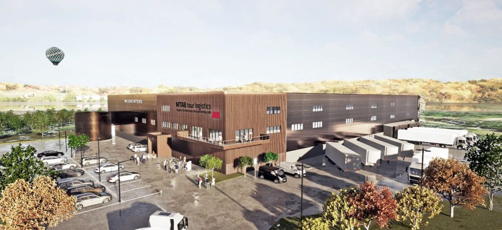 Visionsskiss över den nya logistikbyggnaden med bruna paneler